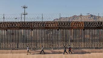 As economies struggle with COVID-19 pandemic, wealthy nations wage global battle for migrants