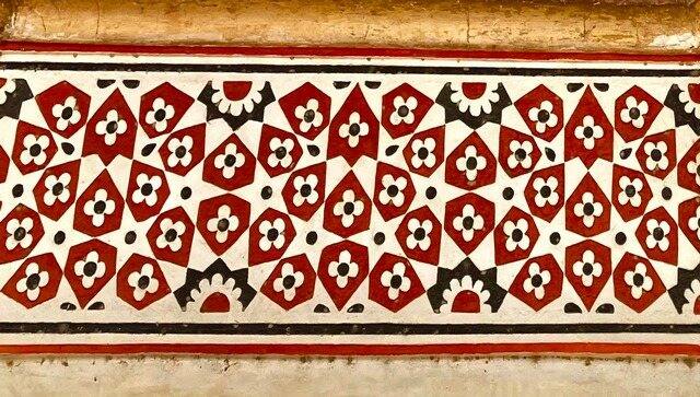 The motifs on one particular section of this 16th Century building bear an uncanny resemblance to the signature four-petalled flower motif on the Monogram logo of Louis Vuitton. Image courtesy: AKTC