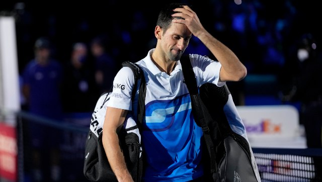 Novak Djokovic tight-lipped on Australian Open after vaccine demand confirmed Novak Djokovic tight-lipped on Australian Open after vaccine demand confirmed