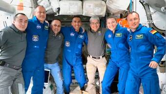 SpaceX capsule with crew of four docks with International Space Station