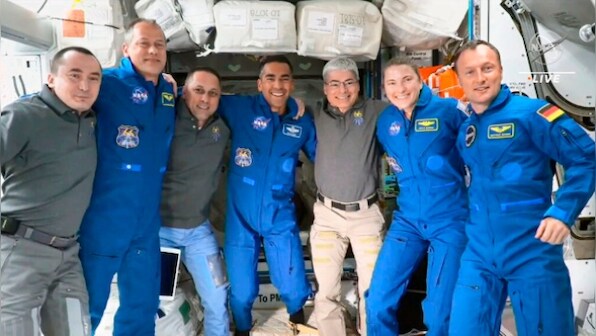 SpaceX capsule with crew of four docks with International Space Station