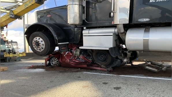 US woman survives after car crushed by an 18-wheeler truck; walks out with minor injuries