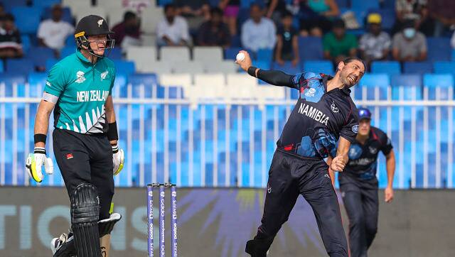 David Wiese in action after Namibia won the toss and opted to bowl. Wiese got rid of Martin Guptill (18) in the fifth over. AP 
