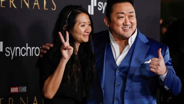 Chloe Zhao and Don Lee at the world premiere of Eternals in Los Angeles