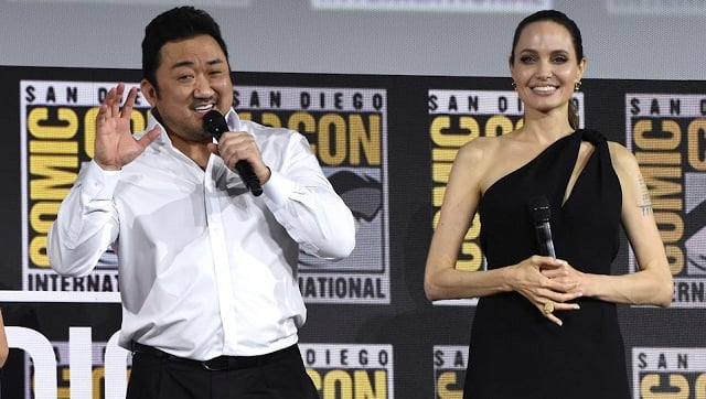 Don Lee, left, and Angelina Jolie participate in the Marvel Studios panel on day three of Comic-Con International on Saturday, July 20, 2019, in San Diego. (Photo by Chris Pizzello/Invision/AP)