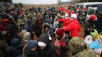 Poland-Belarus border crisis: Polish forces use water cannons on migrants who threw stones