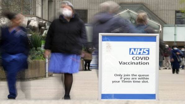 'An epidemic upon an epidemic': Omicron infections drive UK's COVID-19 cases to a record high