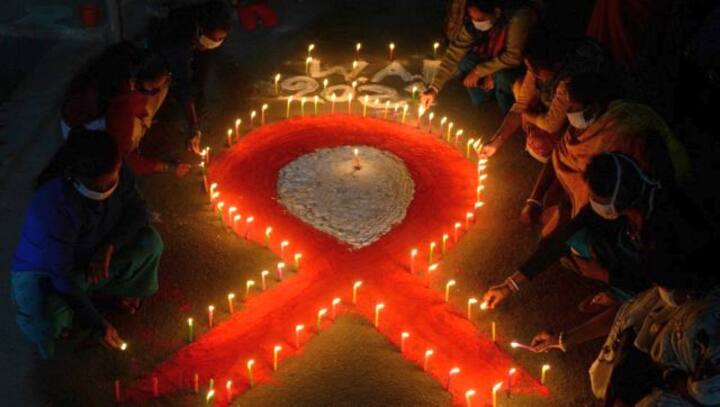 Candle marches to distributing condoms: How India celebrated World AIDS Day