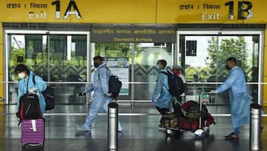 India's new rules for international flyers kick in from today as new COVID-19 variant Omicron spreads