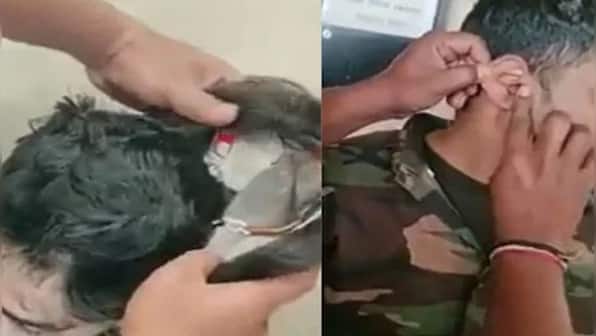 Watch: UP Police candidate caught trying to cheat with bluetooth device in wig