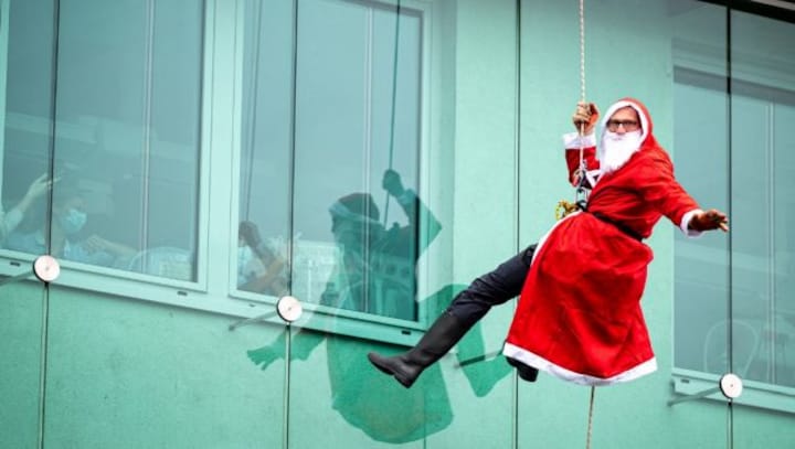 Ho, ho, ho: From surfing to paragliding, Santa Claus is everywhere!