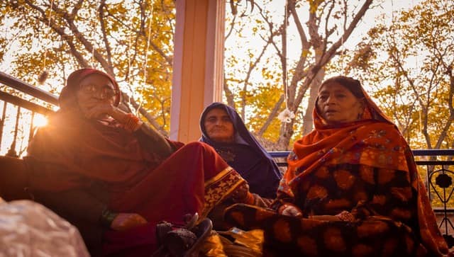 Three octagenarian Afghan women, guests at a local wedding, dressed in Afghan attire. Image courtesy: Mudasir Rawloo 