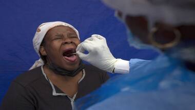 South Africa lifts restrictions as Omicron-driven COVID-19 wave subsides