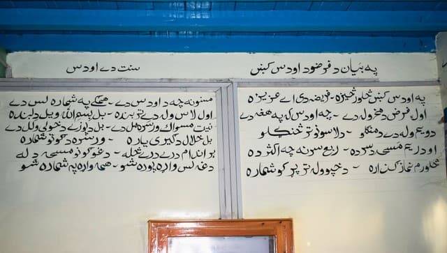 Graffiti written on a wall in Pashtun language inside the mosque. Image courtesy: Mudasir Rawloo 