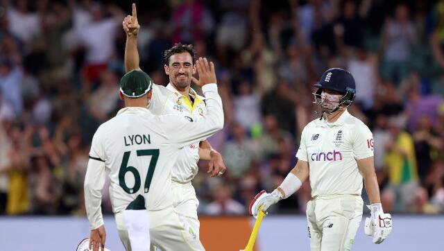 Australia left-arm seamer Mitchell Starc celebrates after removing England opener Rory Burns on Day 2 of the Day-Night Ashes Test in Adelaide. AP
