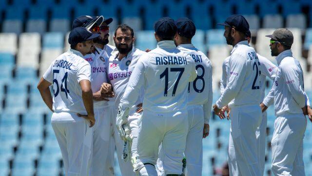 India's bowler Mohammed Shami, facing camera, celebrates with teammates after dismissing South Africa's batsman Keegan Petersen for 15 runs, during the third day of the Test Cricket match between South Africa and India at Centurion Park in Pretoria, South Africa, Tuesday, Dec. 28, 2021. (AP Photo/Themba Hadebe)