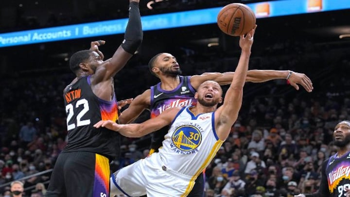 NBA: Stephen Curry powers Warriors past Suns, Nets thwart Lakers