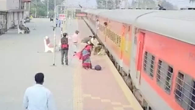 Watch: RPF Sub-Inspector saves woman from falling under train, see video here Watch: RPF Sub-Inspector saves woman from falling under train, see video here