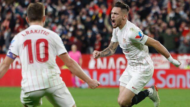 Sevilla's Lucas Ocampos, reacts after scoring during the Spanish La Liga soccer match between Sevilla and FC Barcelona at the Ramon Sanchez-Pizjuan stadium in Seville, Spain, Saturday, Dec 18, 2021. (AP Photo/Angel Fernandez)