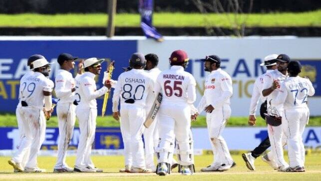 Sri Lanka’s players celebrate their win at the end of the second Test between Sri Lanka and West Indies at the Galle International Cricket Stadium in Galle on Friday. AFP