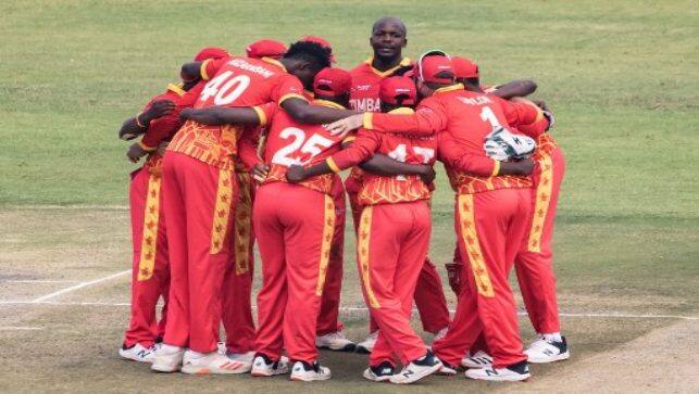 Zimbabwe’s Luke Jongwe looks up from a team huddle after winning the second Twenty20 against Pakistan at the Harare Sports Club in Harare on 23 April, 2021. AFP File 