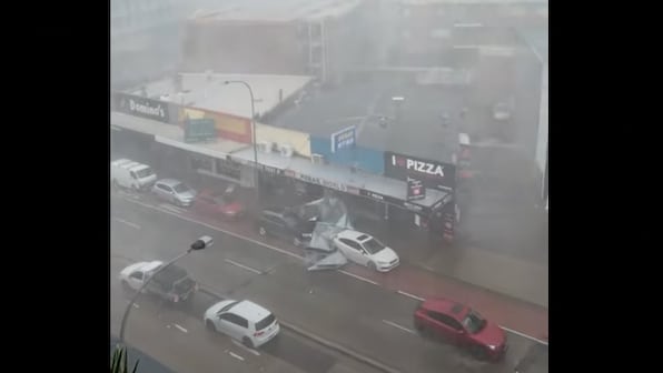 Australia: Metal roof crashes between cars during storm, watch viral video here