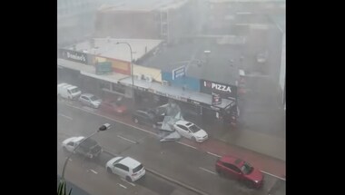 Australia: Metal roof crashes between cars during storm, watch viral video here