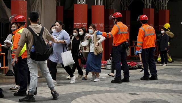 Hong Kong: 12 injured, dozens trapped on rooftop after major fire breaks out at 38-storey building Hong Kong: 12 injured, dozens trapped on rooftop after major fire breaks out at 38-storey building