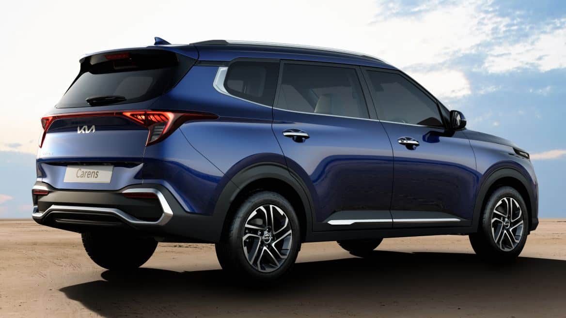 Upright tail section and muscular side profile lend a hint of SUV to the Carens' design. Image: Kia