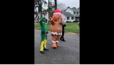 Christmas 2021: Parents dress as Gingerbread man and elf to greet daughter at bus stop