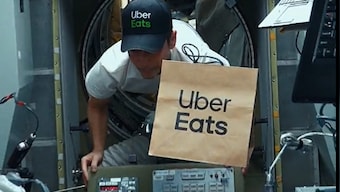 Watch: Japanese billionaire Yusaku Maezawa delivers first Uber Eats in space