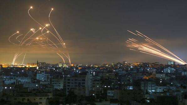 Israel strikes on Gaza kill top militant, tensions escalate