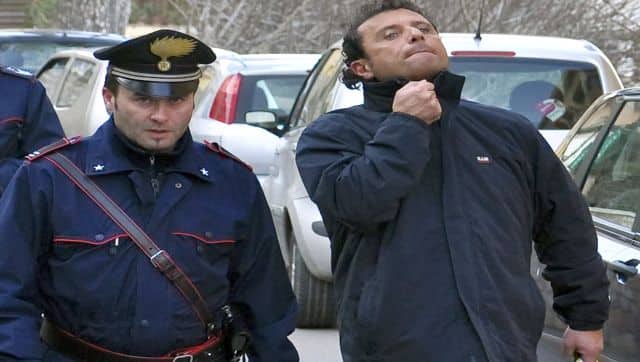 File image of Francesco Schettino, (right), the captain of the luxury cruise ship Costa Concordia, which ran aground in Italy. AP