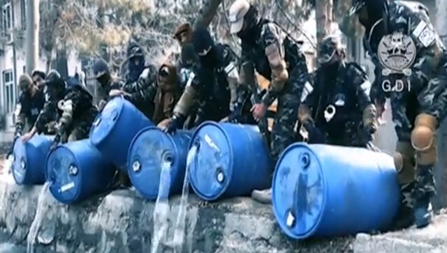 Afghan agents pour 3,000 litres of liquor into Kabul canal as Taliban cracks down on alcohol Afghan agents pour 3,000 litres of liquor into Kabul canal as Taliban cracks down on alcohol