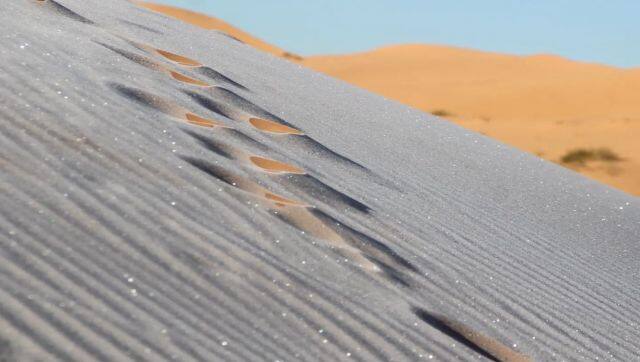 Dunes - ideal for sliding - were also partially covered by the snow and ice. Image Courtesy: karim_bouchetat/Instagram