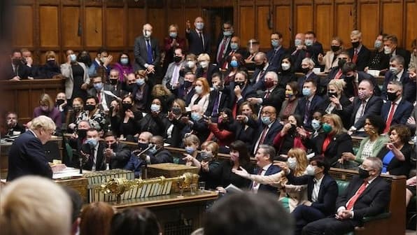 Senior British government ministers rally around Conservative Prime Minister Boris Johnson, for now