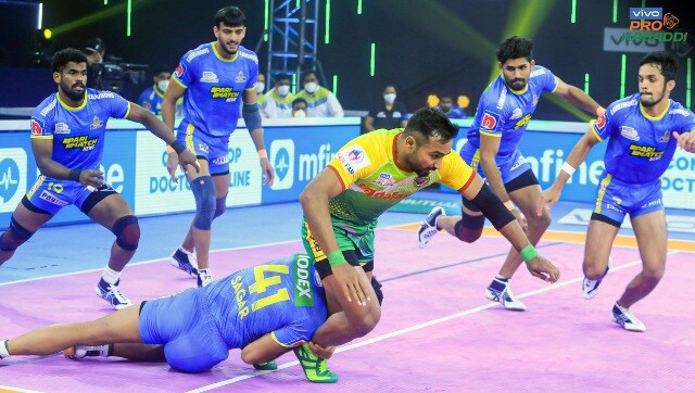 Monu Goyat, in green jersey, of Patna Pirates attempts to score a