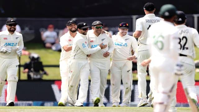 Ross Taylor and Devon Conway of New Zealand celebrate during play on day three of the second Test between Bangladesh and New Zealand at Hagley Oval in Christchurch, New Zealand, on Tuesday. AP