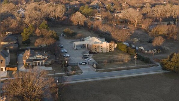 Captor shot dead after taking hostages in Texas synagogue identified as British citizen; two other teenagers arrested in Manchester