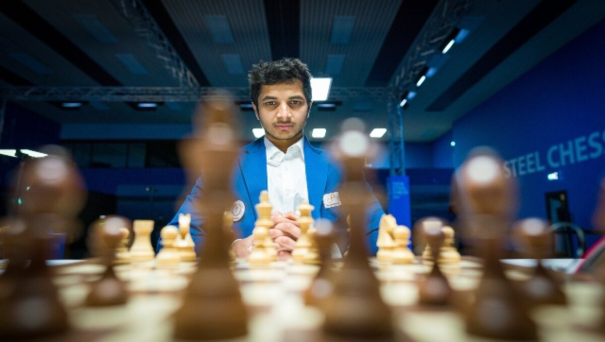 Arjun Erigaisi defeats Wang Hao with the black pieces during the