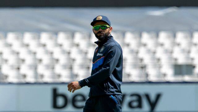 India's captain Virat Kohli leaves the field before the start of the second day of the second Test match between South Africa and India at the Wanderers stadium in Johannesburg, South Africa, on 4 January, 2022. AP File