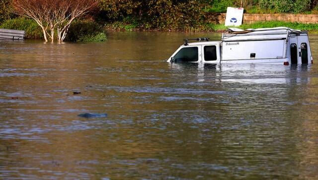 An inundated parking lot in Santa Cruz, California after the Tonga volcano eruption caused tsunamis around the world.AP 