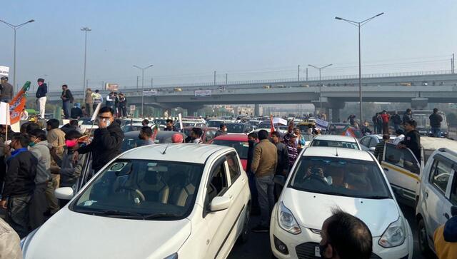 Delhi commuters face traffic snarls as BJP workers stage 'Chakka jam' against AAP's new excise policy Delhi commuters face traffic snarls as BJP workers stage 'Chakka jam' against AAP's new excise policy