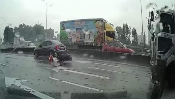 Watch: Motorcyclist crashes right in front of oncoming truck; see what happens next