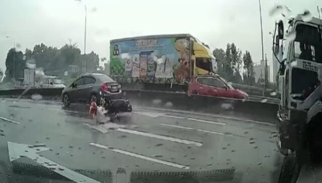 Watch: Motorcyclist crashes right in front of oncoming truck; see what happens next Watch: Motorcyclist crashes right in front of oncoming truck; see what happens next
