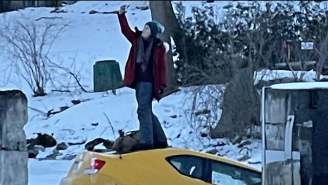Watch: Canadian woman takes selfie standing atop car as it sinks into icy river