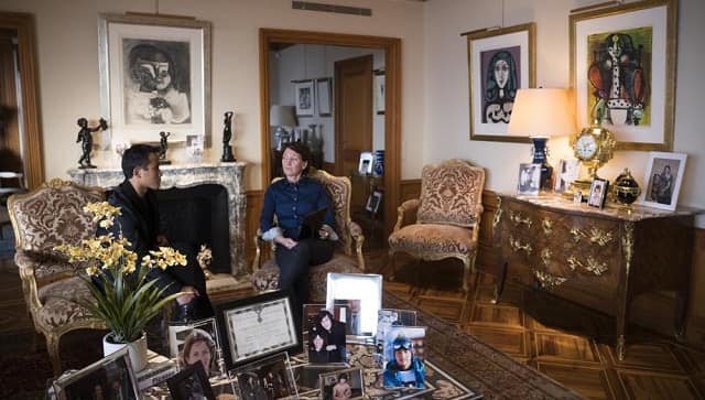 Marina Picasso, right, granddaughter of artist Pablo Picasso, and her son Florian Picasso, left, pose for a photo during an interview with the Associated Press in Cologny near in Geneva, Switzerland, Tuesday, Jan. 25, 2022 | (AP Photo/Boris Heger)