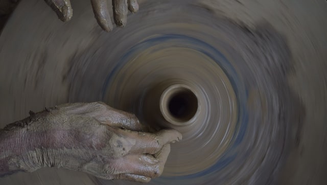 Assadullah Kumar makes a coal bowl for a hubble bubble. This sells at rupees 5 each. Typically, Kumar makes around 50such bowls a day. Image procured by author