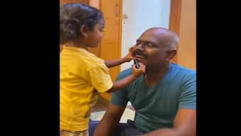 IPS officer shares video of daughter playing pretend makeup with him, wins internet