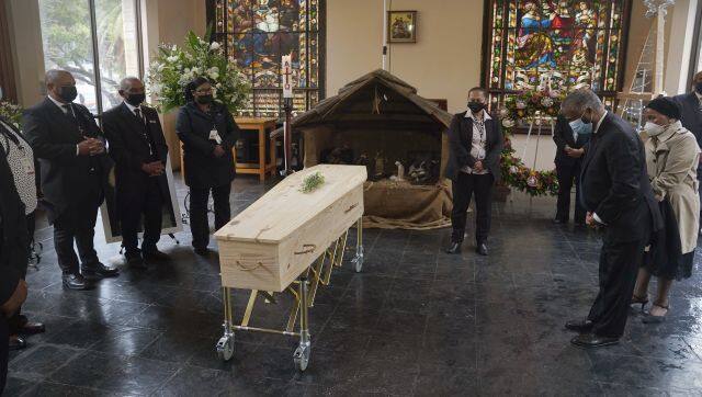 Former South African president Thabo Mbeki (front right), and other mourners pay their last respects for Anglican Archbishop Emeritus Desmond Tutu during his funeral at the St George's Cathedral in Cape Town, South Africa. AP